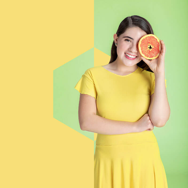 Bonaterra // Girl Holding a Grapefruit Picture